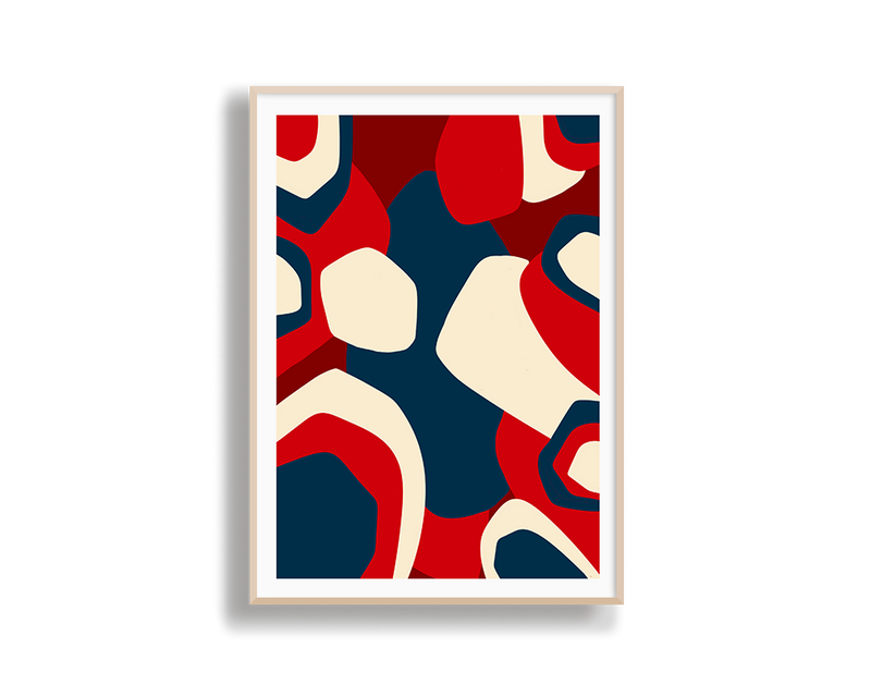 Abstract art print with red, blue, and beige shapes in a wooden frame on a white background