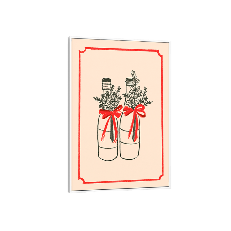 Framed artwork of two bottles with red bows and floral arrangements on a beige background